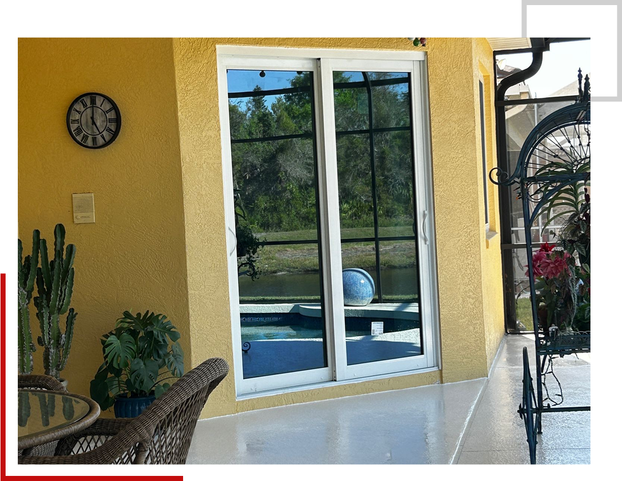 Patio view with sliding glass doors.